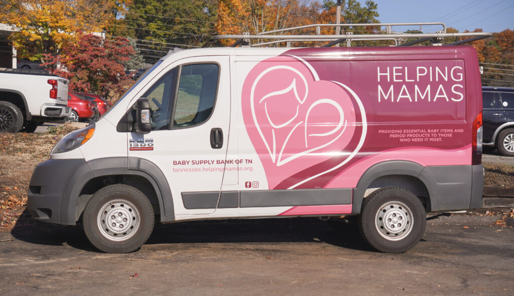Distribution Van Wrapping with Helping Mamas Logo and Mission